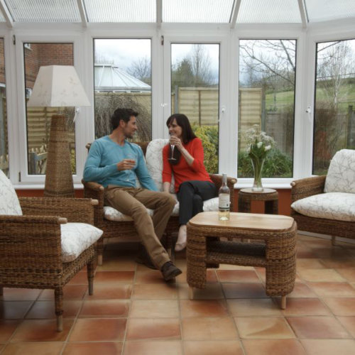 couple sitting on bantul sofa set