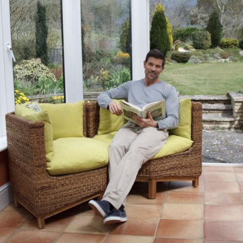 man reading on jepara corner chairs sofa