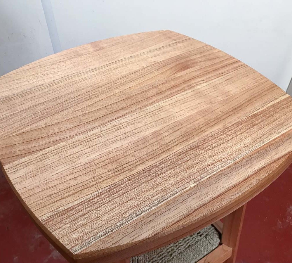 top wooden surface of a stool