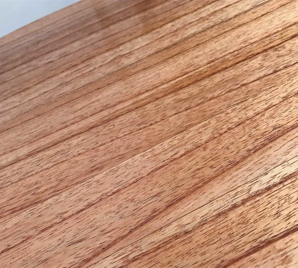 close view of wooden stool's top surface